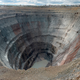 Illustration for article titled These 21 Enormous Man Made Holes Will Give You Vertigo